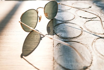 Close-up of sunglasses on table