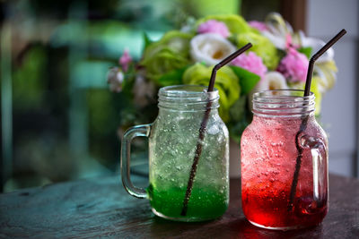 Close-up of drink in glass jar on table