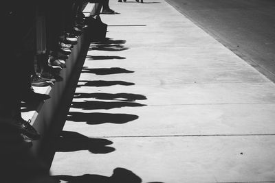 View of shadows on pavement