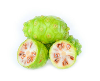 Close-up of fruits against white background