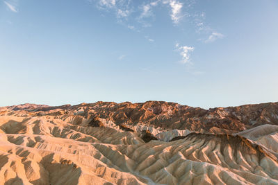 Scenic view of rock formations against sky