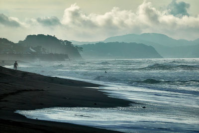 Scenic view of beach against sky