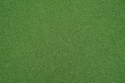 Artificial green grass for background. green grass turf floor texture background.