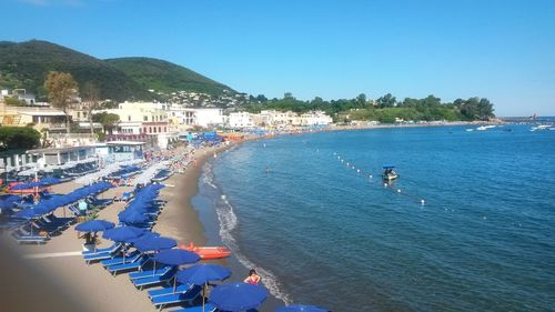 High angle view of beach against clear blue sky