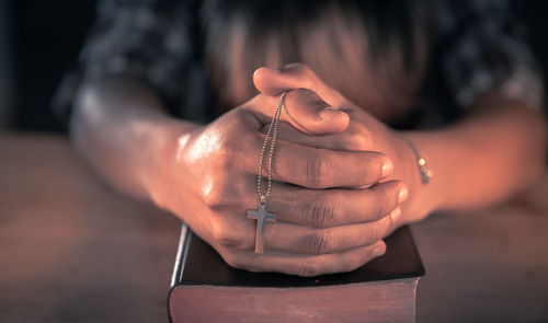 Close-up of woman holding hands