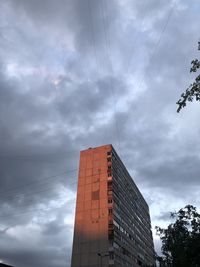 Low angle view of modern building against sky