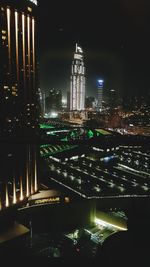 Illuminated buildings in city at night
