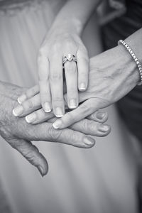 Close-up of couple holding hands