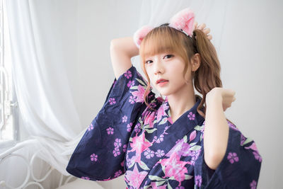 Portrait of cute girl at home