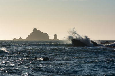 Scenic view of sea against clear sky