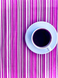 Directly above shot of coffee cup on table