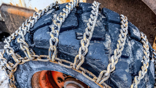 High angle view of rope on metallic structure