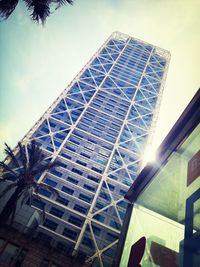 Low angle view of modern building against sky