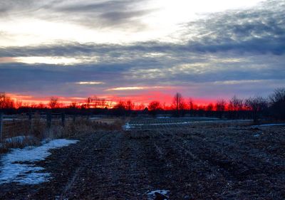 Scenic view of landscape against sky during sunset