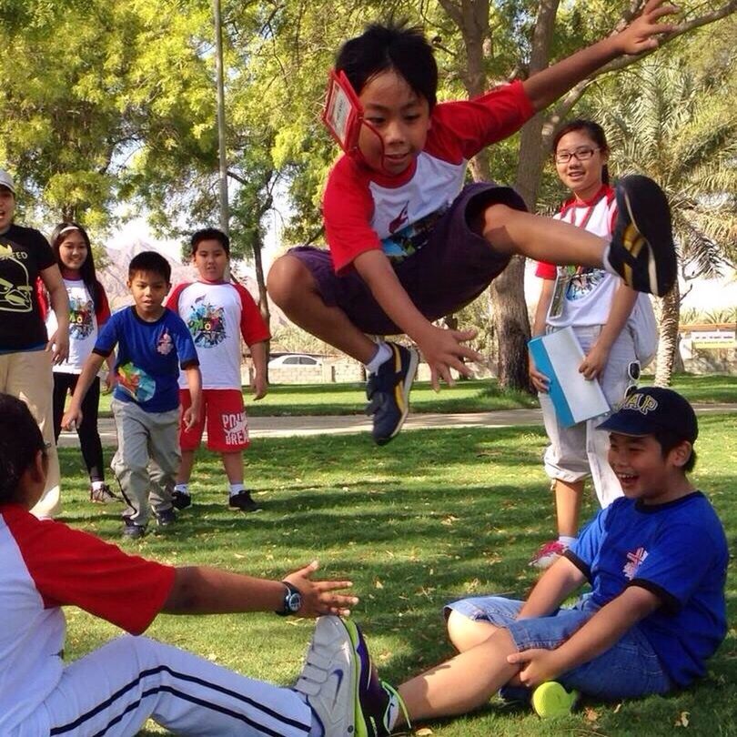 person, leisure activity, lifestyles, happiness, childhood, smiling, togetherness, fun, casual clothing, enjoyment, bonding, elementary age, boys, girls, full length, portrait, looking at camera, park - man made space