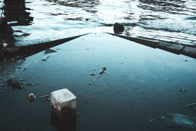 Reflection of person in lake