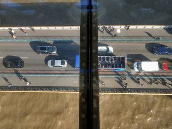 High angle view of airport runway seen through glass window