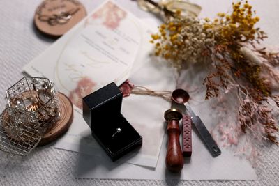 High angle view of clock on table