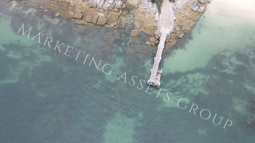 High angle view of text on water