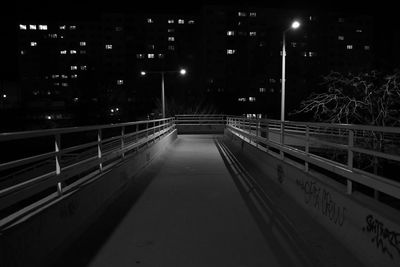 Illuminated street lights at night