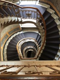 Directly below shot of spiral staircase of building