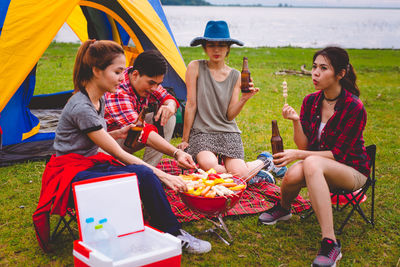 People sitting on land
