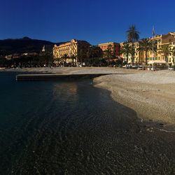 View of beach with buildings in background
