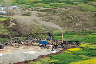 High angle view of vehicle on field