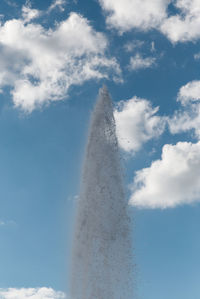 Low angle view of splashing water against sky