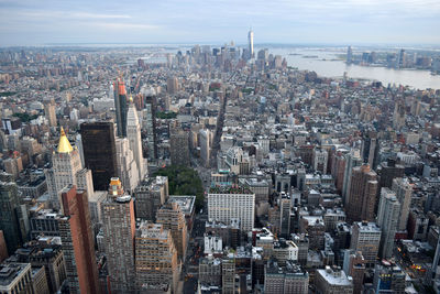 Manhattan against sky seen from empire state building