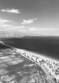 High angle view of road by sea against sky
