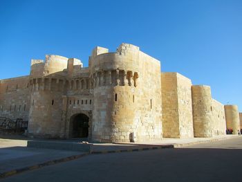 View of historic building against blue sky