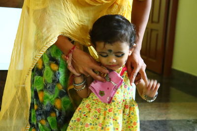 Mother and girl at home
