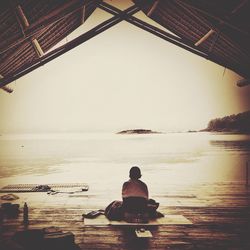 Woman sitting in water