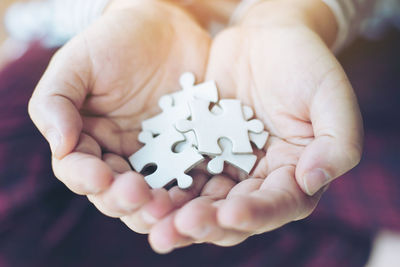 Close-up of woman holding hands