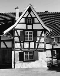 Exterior of old building in town against sky