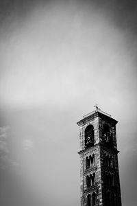 Low angle view of clock tower against sky