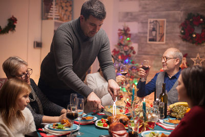 Friends sitting on table