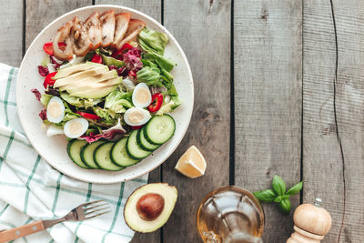 High angle view of fruit salad in bowl on table