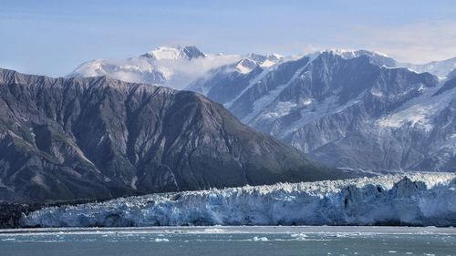 Scenic view of snow covered mountains