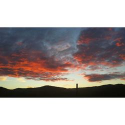 Scenic view of mountains at sunset