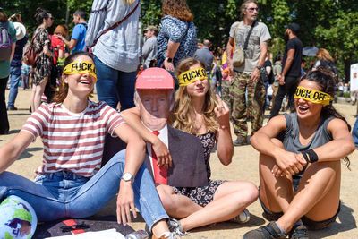 Group of people sitting outdoors