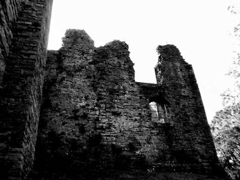 Low angle view of old ruins against clear sky