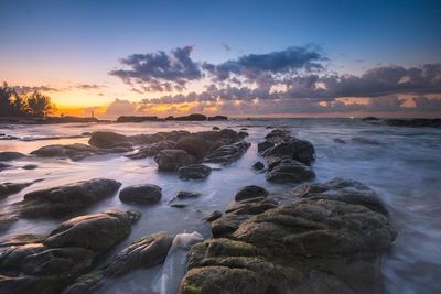 Scenic view of sea against sky during sunset