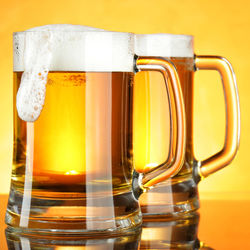 Close-up of beer glass on table