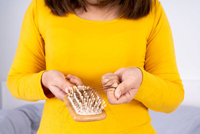 Close-up of woman holding ice cream