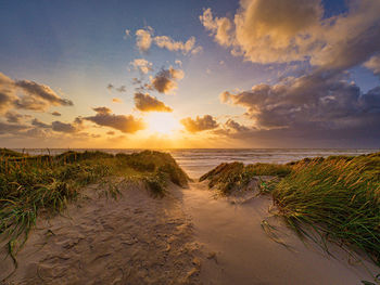 Scenic view of sea against sky during sunset