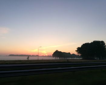 Scenic view of silhouette landscape against sky during sunset