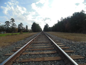 Railroad track against sky