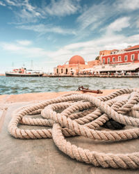 Rope from a ship at rethymnon harbour. crete, greece.